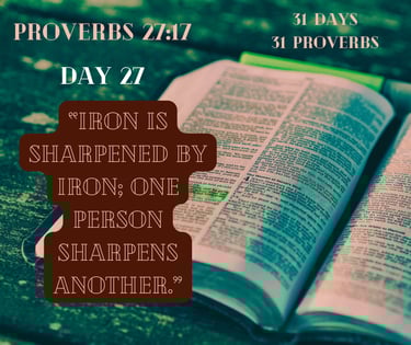 An open Bible displays Proverbs 27:17