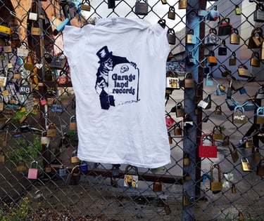 T-shirt with label logo on a background of padlocks