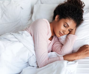 lady who is using the Breathbit and the nasivent in bed.