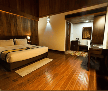 Spacious deluxe room at TSG Blue Resort Andaman with elegant interiors