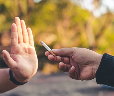 person refusing a cigarette
