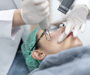 person getting pico laser facial treatment