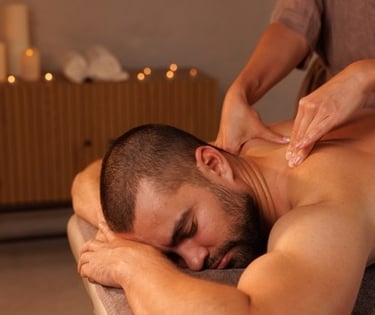 a man getting a massage at a spa