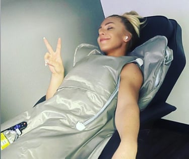 a woman laying in Infrared bodywrap to lose weight, detox water weight