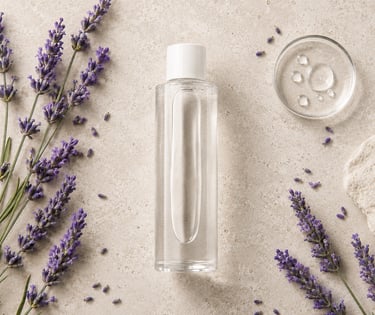 Lavender water bottle surrounded by Lavandula angustifolia flowers