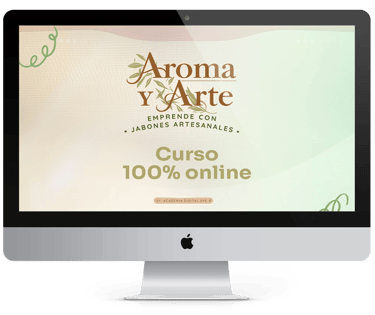A computer screen displays the "Aroma y Arte" logo, emphasizing a 100% online course for handmade soap making.