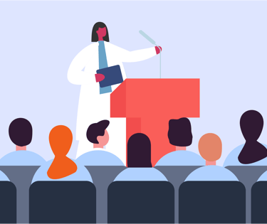 a man in a white lab coat and a microphone in front of a speaker