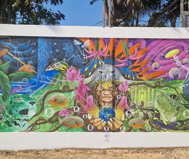 Vibrant jungle mural featuring Amazonian wildlife, indigenous figures, and nature symbolism.