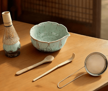 matcha tea kit on wodden table