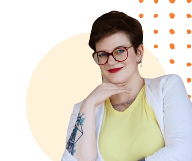 a photo of Swana Schuchmann, wearing a white blazer, smiling
