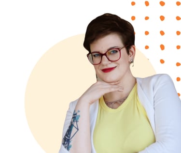 a photo of Swana Schuchmann, wearing a white blazer, smiling