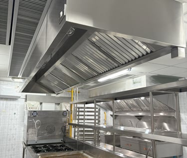 Commercial kitchen ventilation and exhaust hood system installation designed for heat, smoke