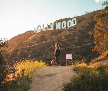 woman-with-dog-hollywood-sign-hike