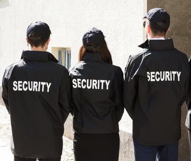 a group of security officers standing in line