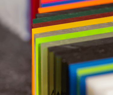 a stack of colorful colored acrylic