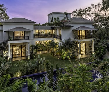 a house with a large garden and a pool