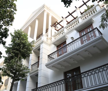a building with a balcony and balcony railings