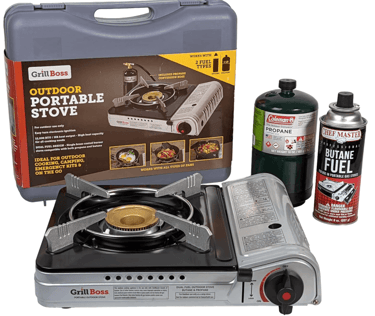 a stove top stove with a case and a bottle of water