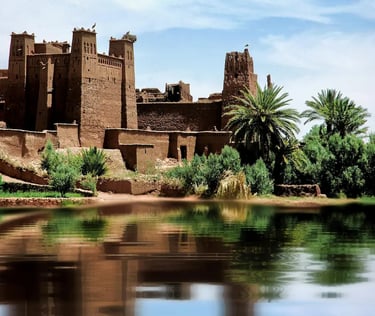 Towering walls of the ksar of Ait Benhaddou reflected in the waters of the Ounila river