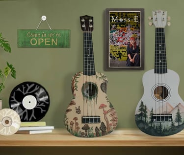 A hand-painted ukulele and records and CDs for sale in Moss.E's shop