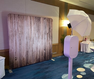 a photo of a photo booth with a white umbrella