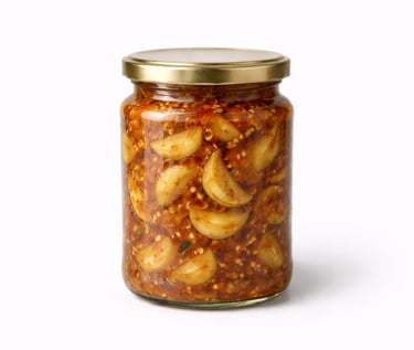 Spicy garlic pickle prepared in traditional oil blend for global markets