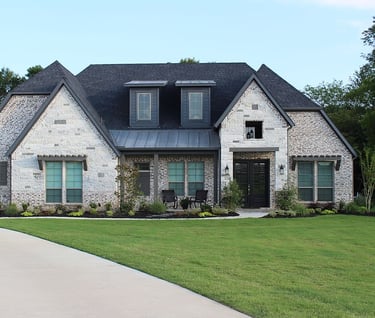 a house with a large driveway and a driveway