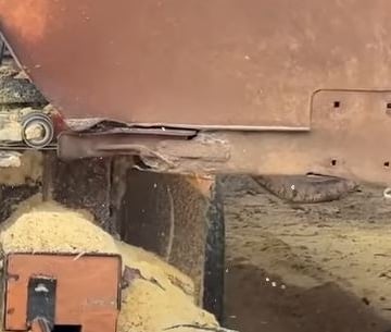 Wood-Mizer LT70 sawing lumber.