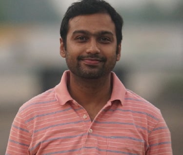 a man in a pink shirt and a pink shirt