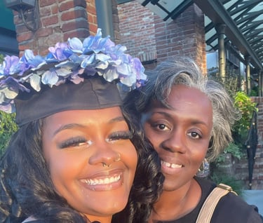 a woman in a graduation cap and gown