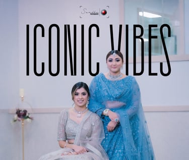 a couple of women in blue dresses and a man in a blue suit