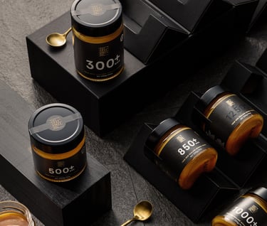 Product photography - a variety of jars of honey styled