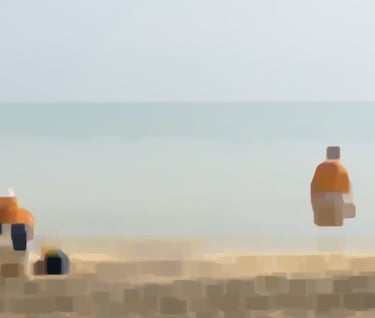 a group of people sitting on a beach