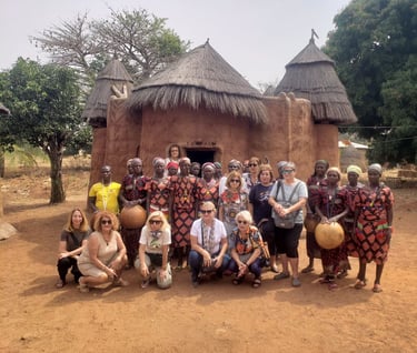 A group of Tourists visiting Tata Somba Village during a Multi-country Trips of Benin, Togo & Ghana