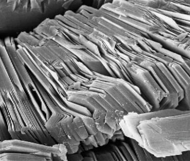 a microscopic image of flocculated clay in soil