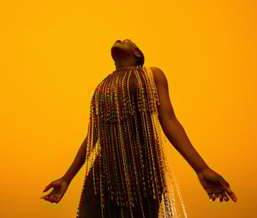 a woman with a long braid hair and a long dress