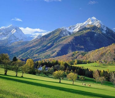 a mountain range with a view of a valley