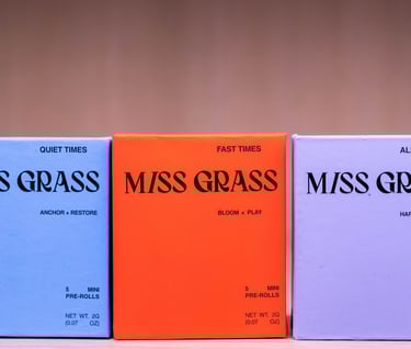 three boxes of miss grass