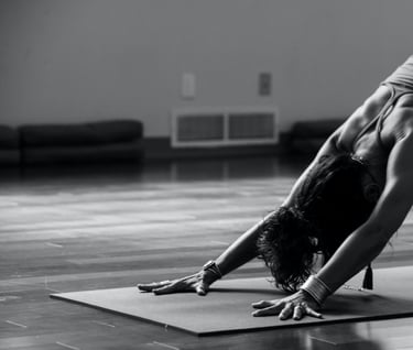 a woman doing a handstand yoga pose
