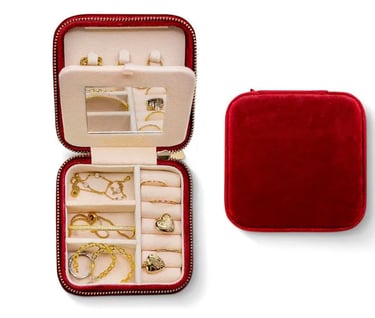 a red velvet case with jewelry inside