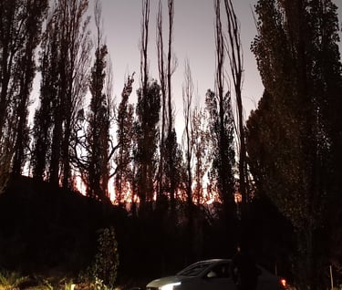 a car parked in a driveway with a car parked in front of it