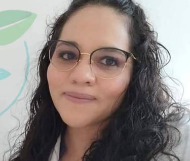 a woman in a lab coat and glasses