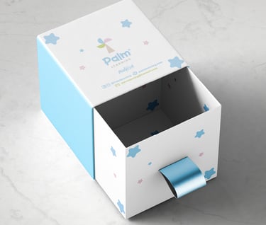 a box with a blue ribbon tied to it