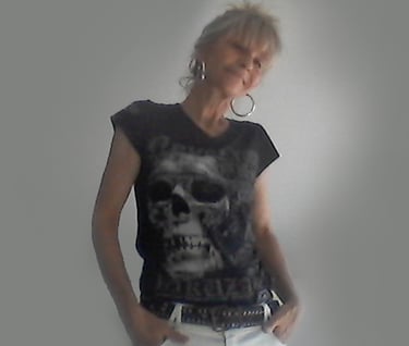 a woman in a black shirt and white pants