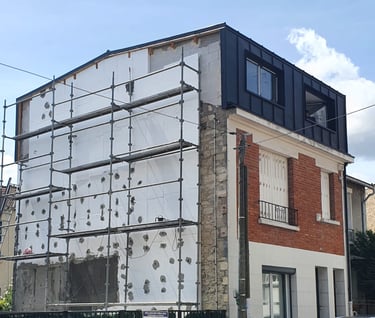 Surelevation of a house with zinc