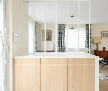 a kitchen with a large mirror and a sink
