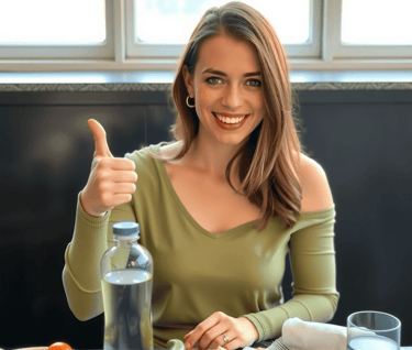 Pretty woman sat at a table 