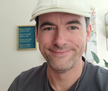 a man with a hat on a white background