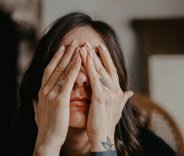 a woman with tattoos on her hands and tatto self doubtos on her hands