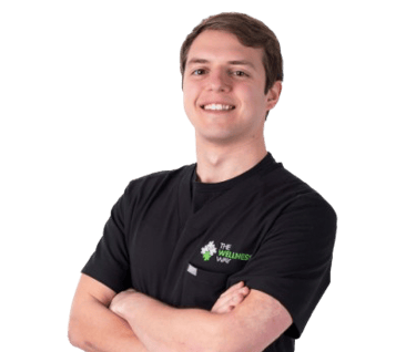Dr. Sean smiling in his headshot